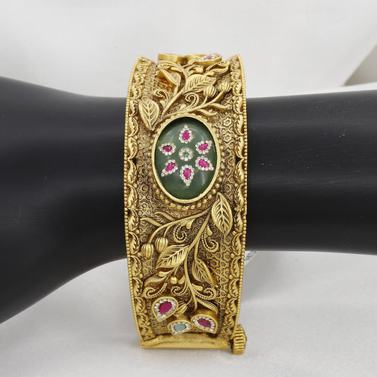 Ornate Floral Bangle Kada with Green Stone & Ruby Accents