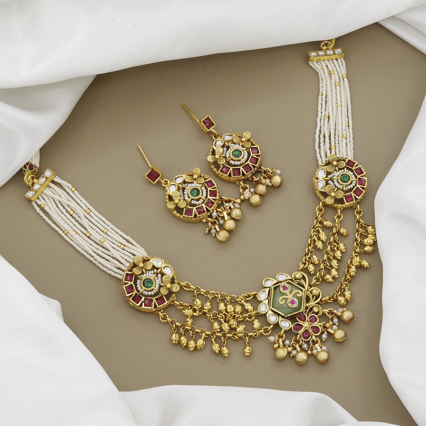Elegant Necklace Set with Multi-String Pearls, Kemp Stones, and Matching Earrings