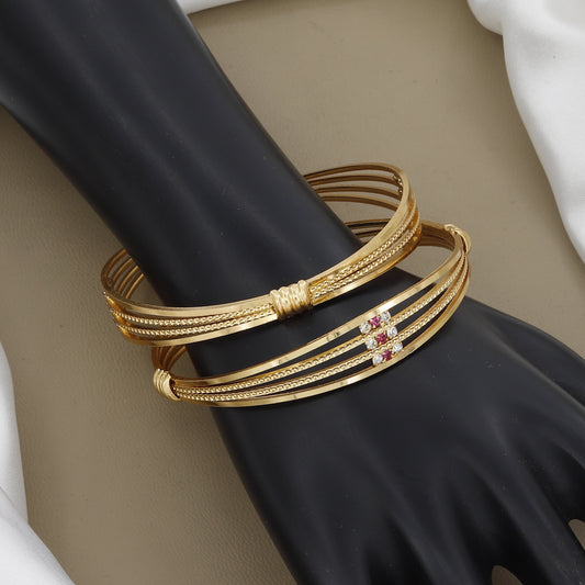 Modern Multi-Line Gold Bangle Set with Ruby and Diamond Accents
