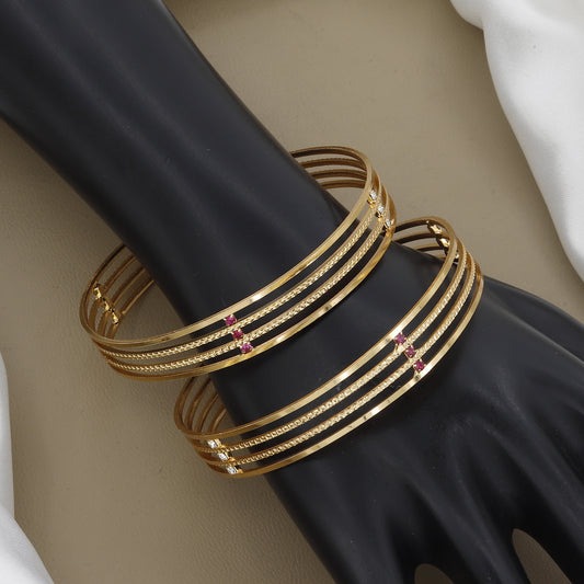Minimalist Four-Line Gold Toned Bangle Set with Red Stones