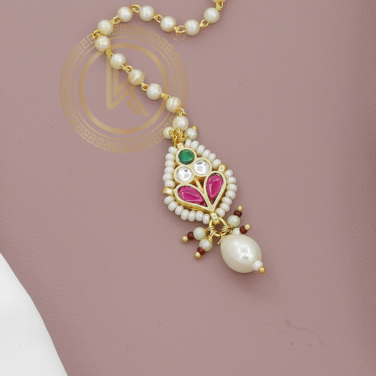 Elegant Pearl Maang Tikka with Green Drop & Pink Kundan Detailing