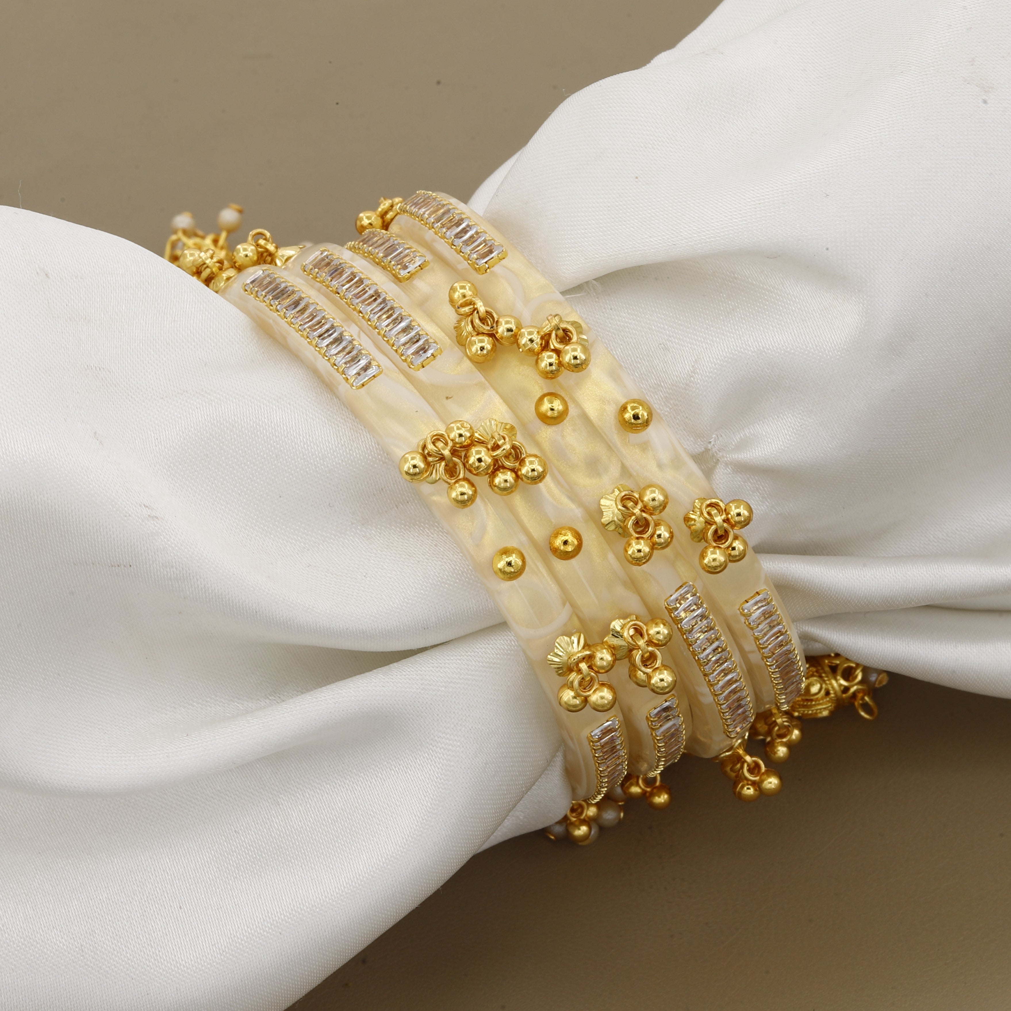 Set of 4 White Pearl-Finish Bangles with Crystal and Gold Accents