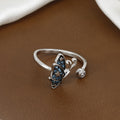 Silver Butterfly Adjustable Ring with Blue Crystals and Star Accents