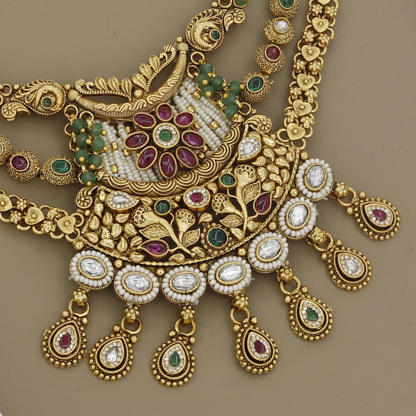 Antique Gold Toned Finish Kundan Necklace Set with Colored Beads