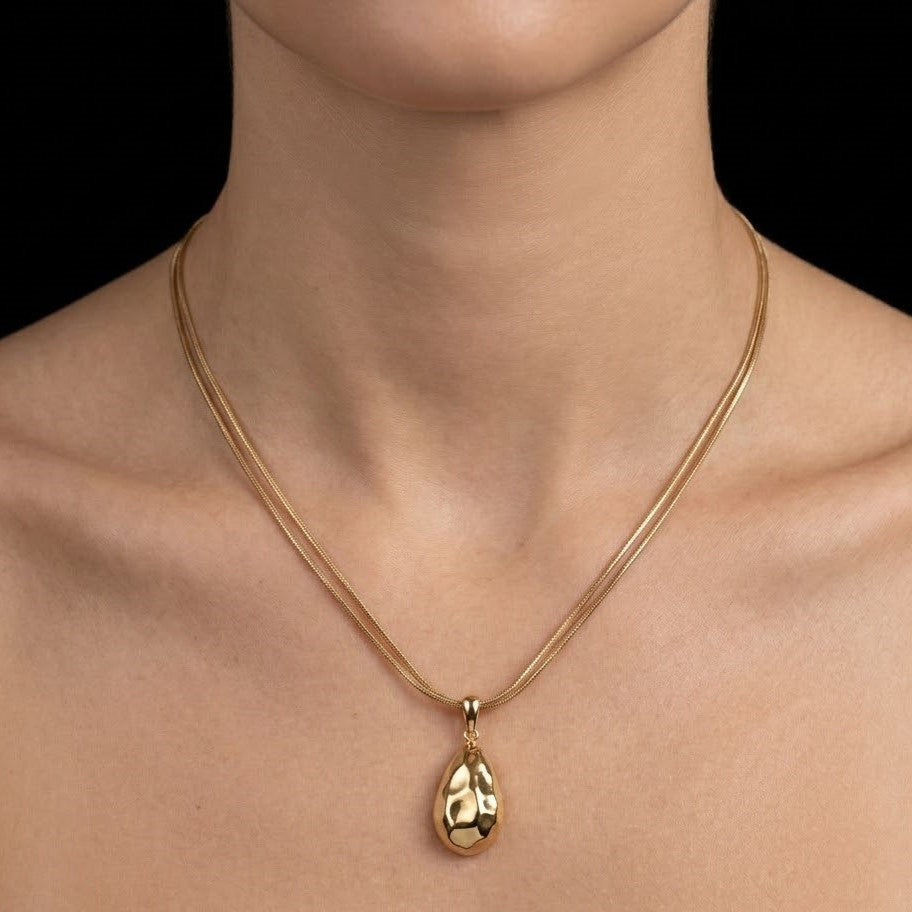 Gold Faceted Teardrop Pendant on Triple-Strand Chain