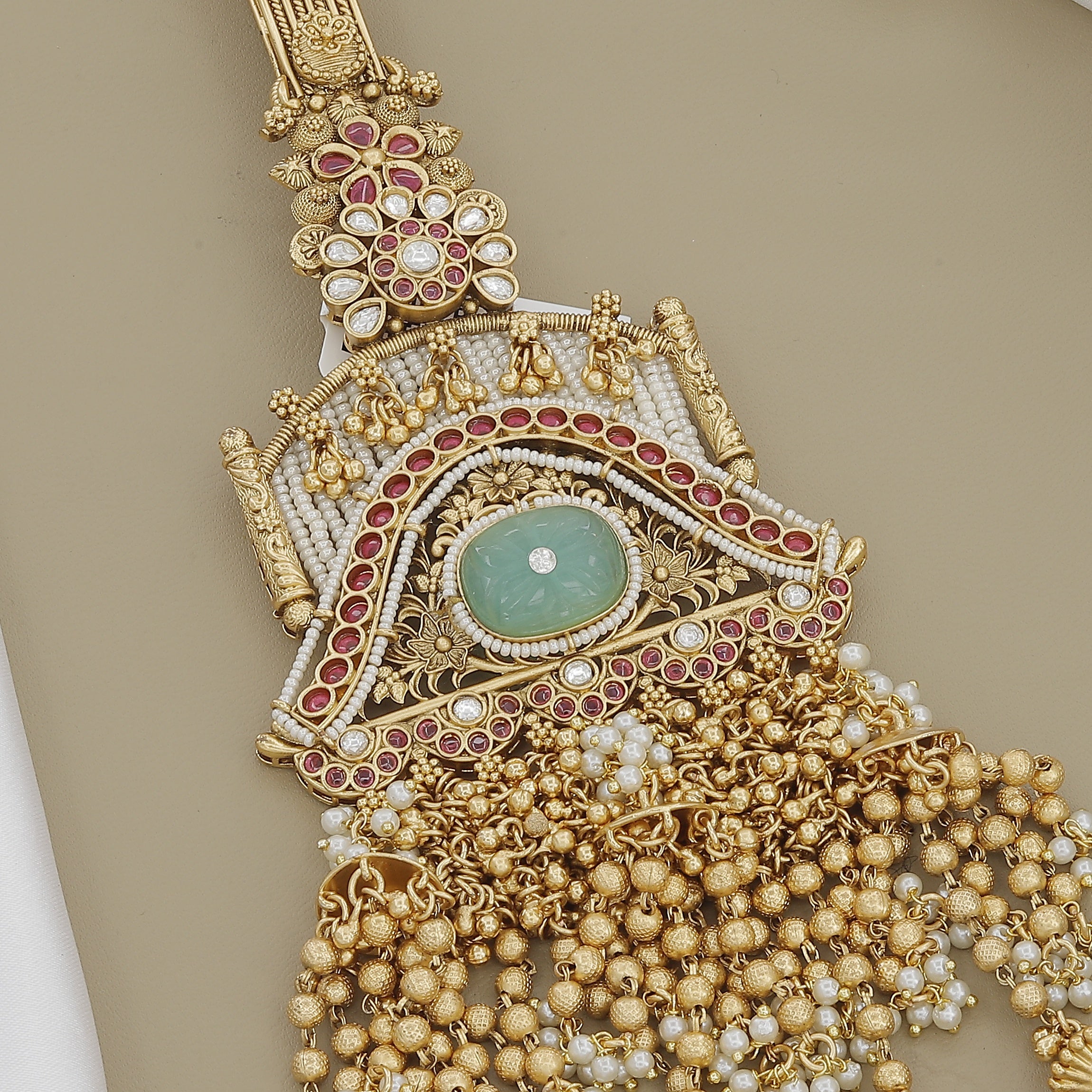 Ornate Temple-Inspired Belly Juda with Green Stone and Pearl Tassels