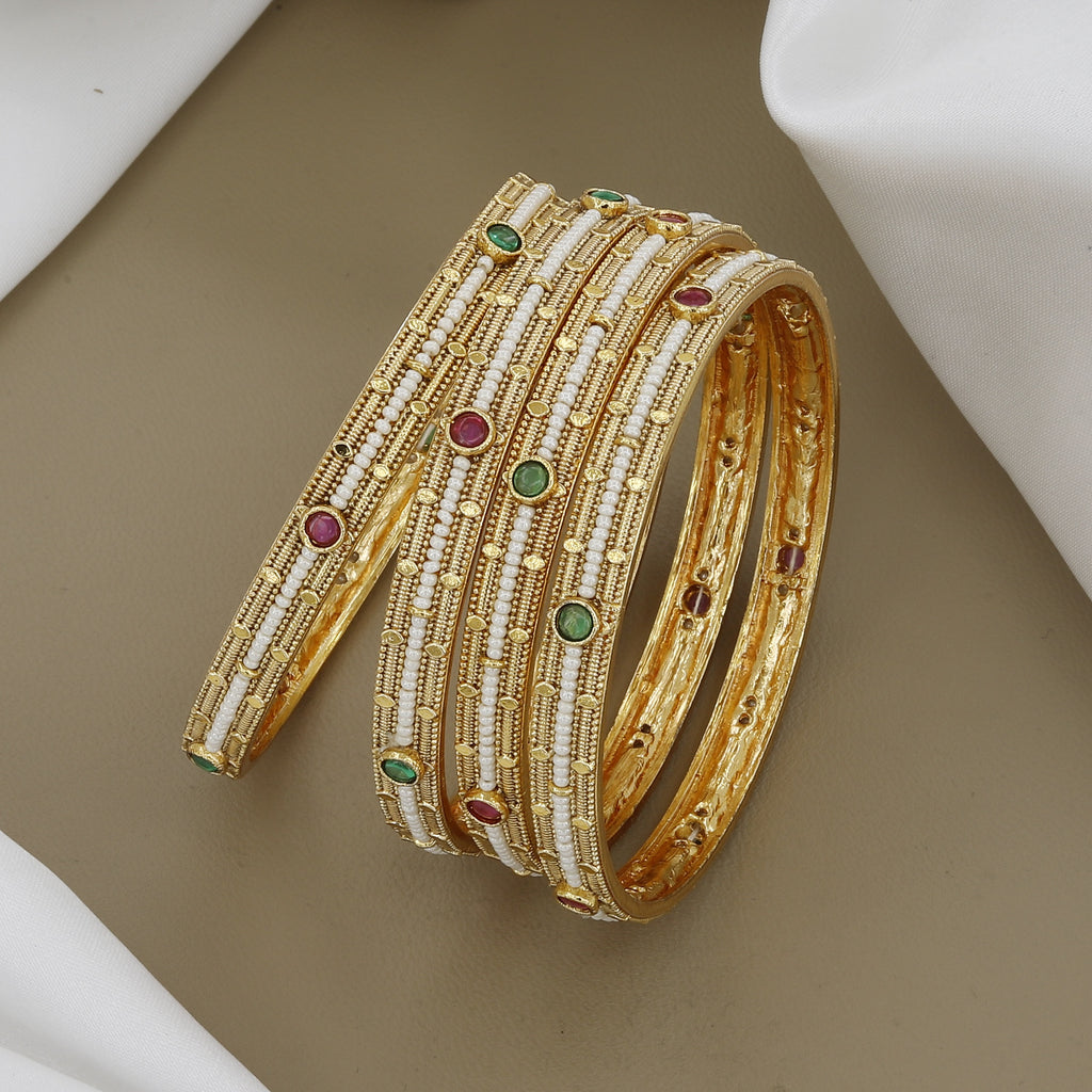 Elegant Pearl Beaded Gold Toned Bangle Set with Kundan Stones