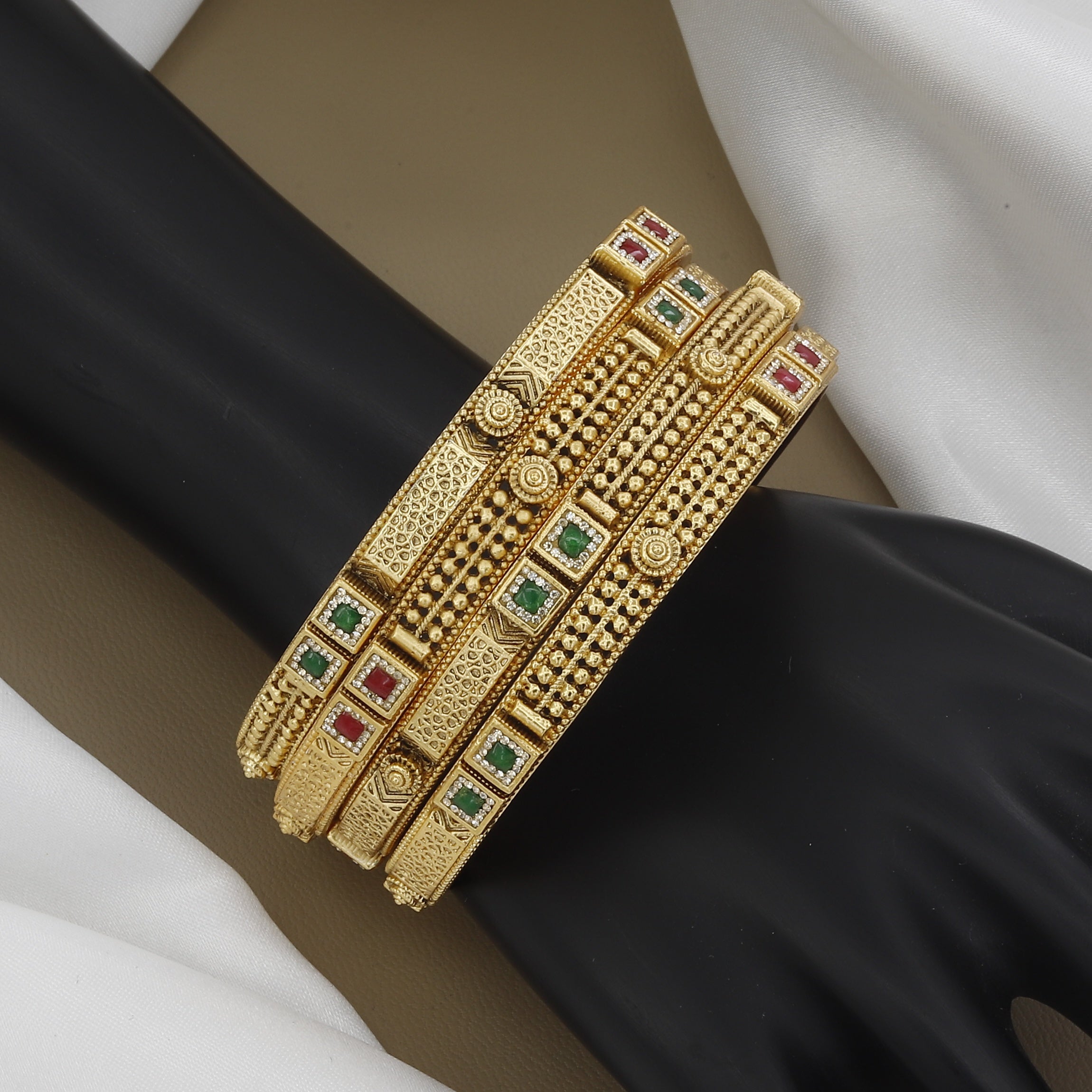 Broad Gold Toned Bangle Set with Square Ruby & Emerald Stones