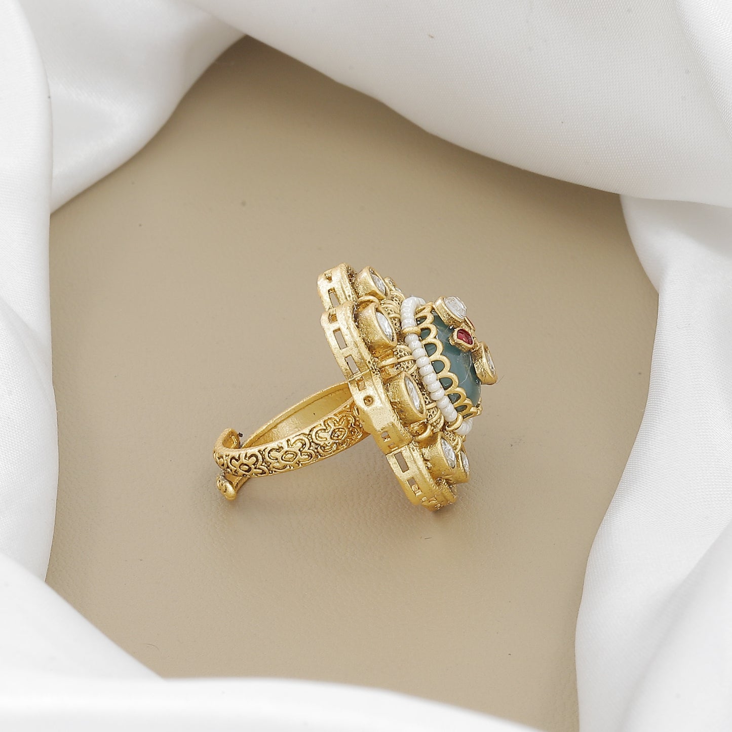 Antique Floral Polki Ring with Carved Green Stone