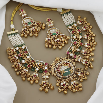 Regal Kundan & Ruby Necklace Set with Intricate Green Stone Detail