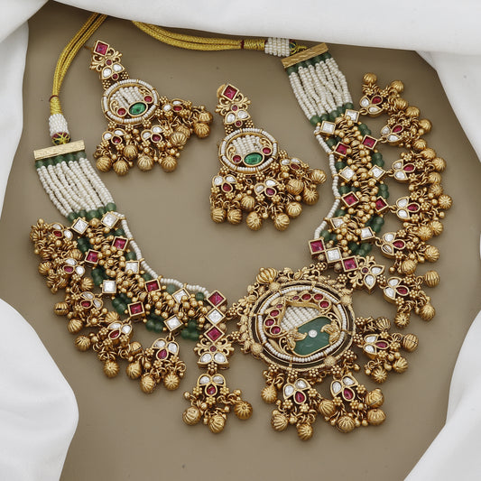Regal Kundan & Ruby Necklace Set with Intricate Green Stone Detail