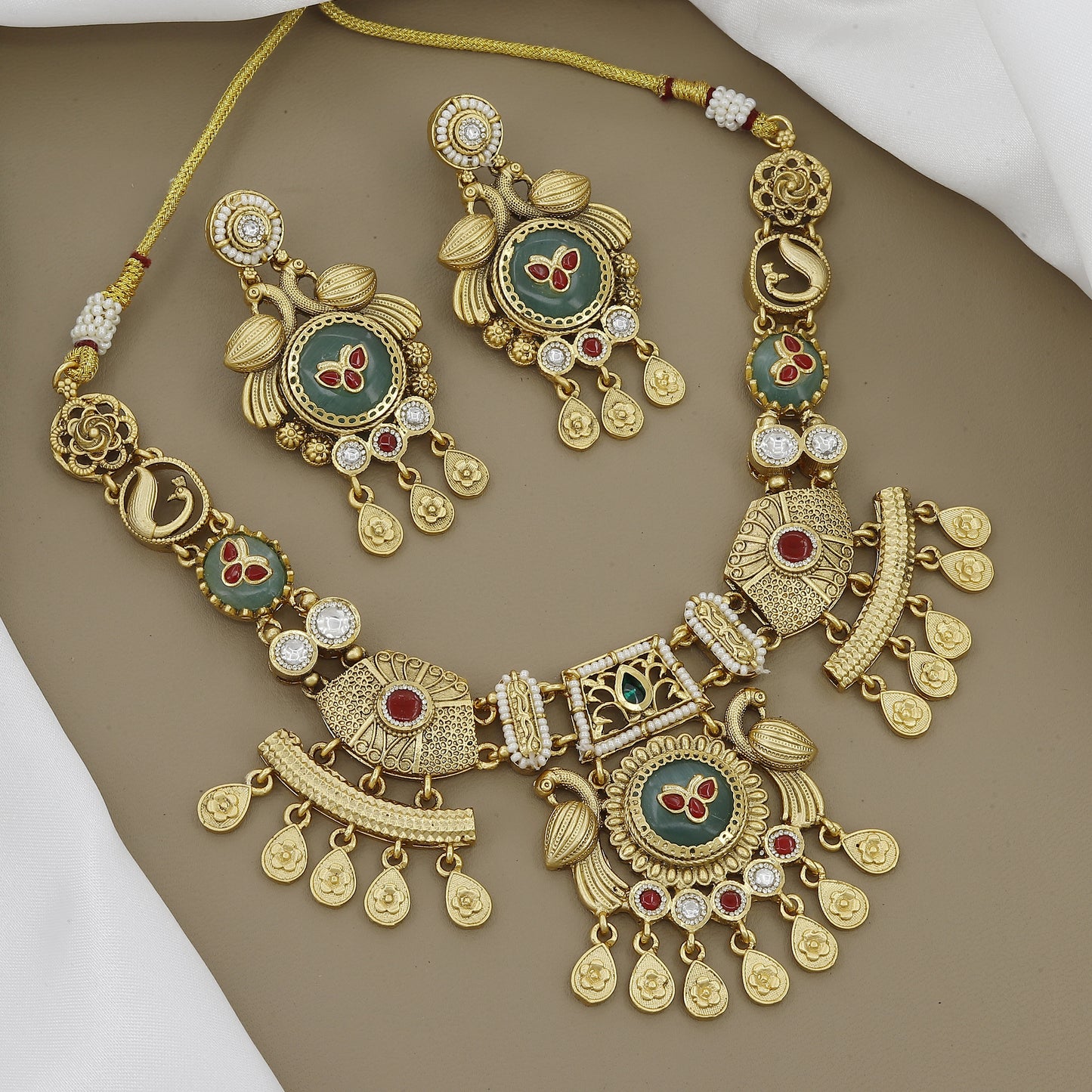 Gold Toned Peacock & Floral Motif Necklace Set with Ruby & Green Stones