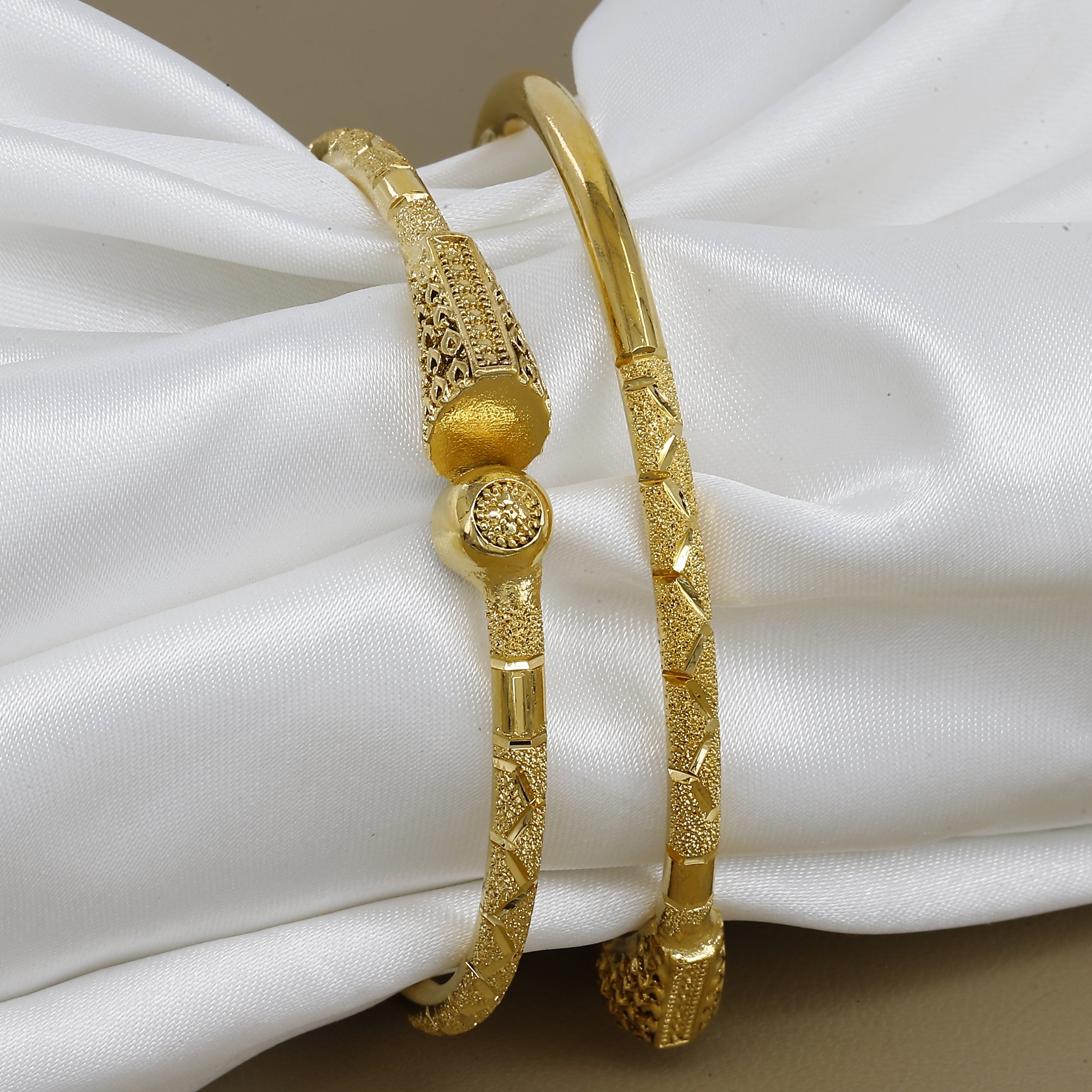 Western Wear Gold Tone Set Of 2 Bangles with Intricate Filigree Design