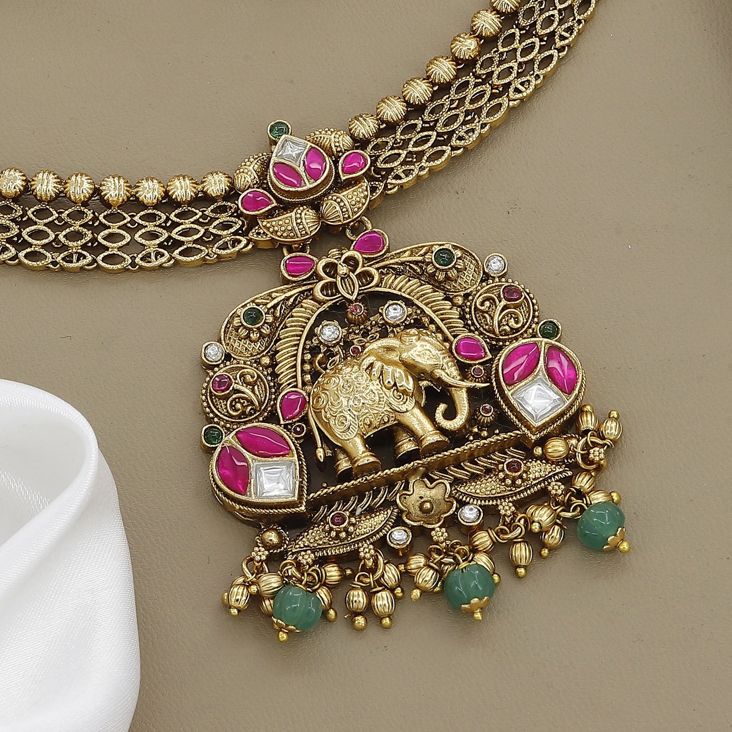 Intricate Antique Gold Tone Necklace with Stone Jhumkas