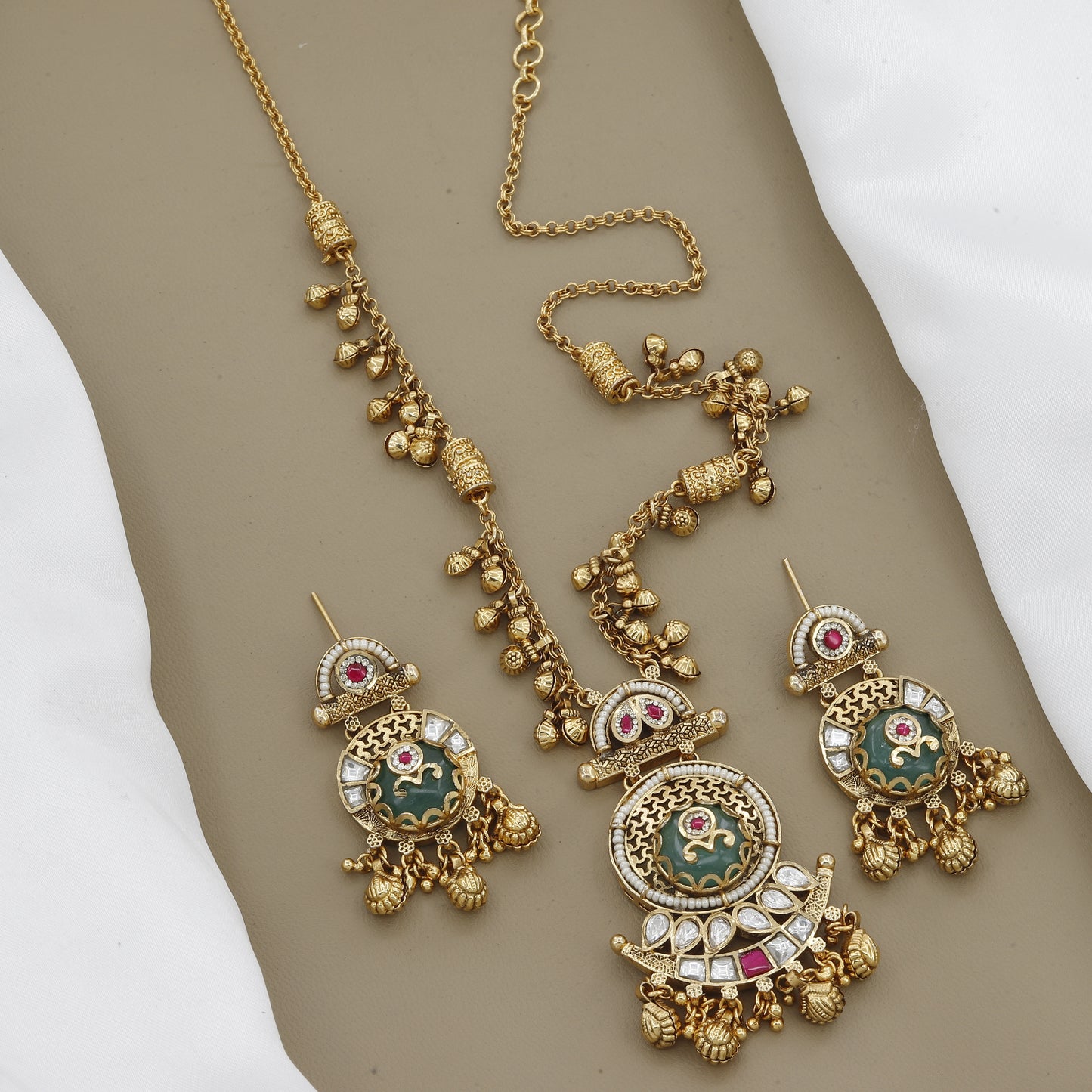 Elegant Antique Necklace Set with Green Stone, Uncut Polki, and Kemp Detailing
