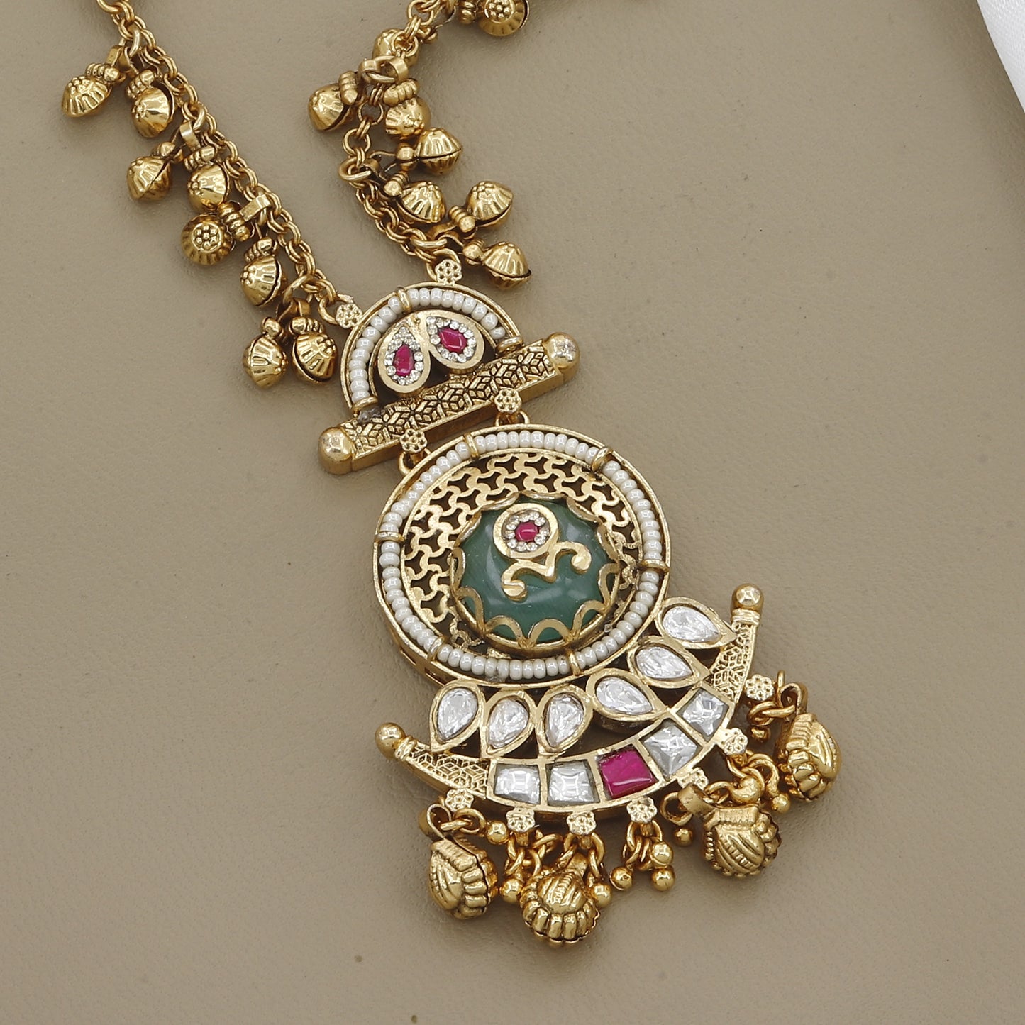 Elegant Antique Necklace Set with Green Stone, Uncut Polki, and Kemp Detailing