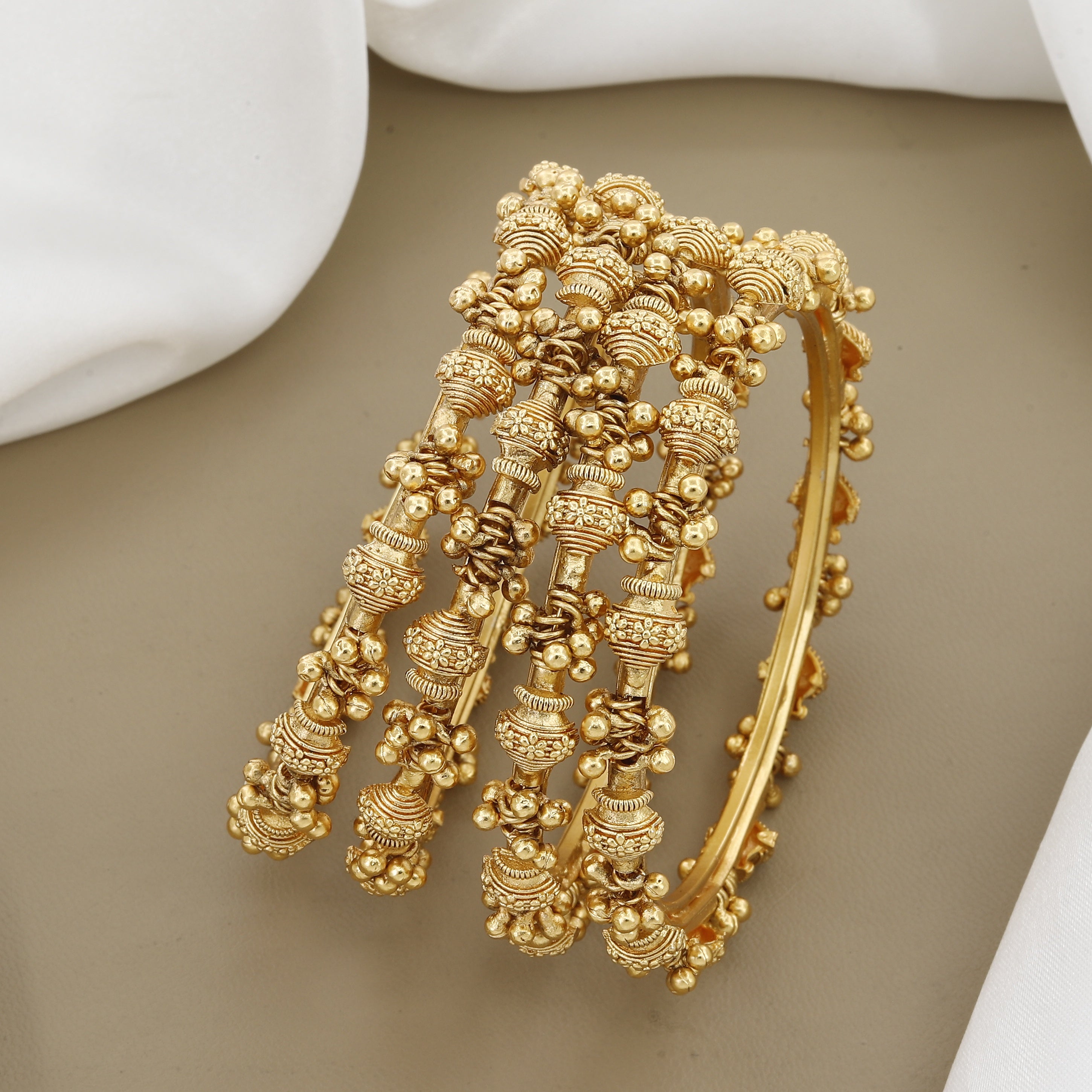 Set of 4 Antique Gokharu Bangles with Traditional Granular Work