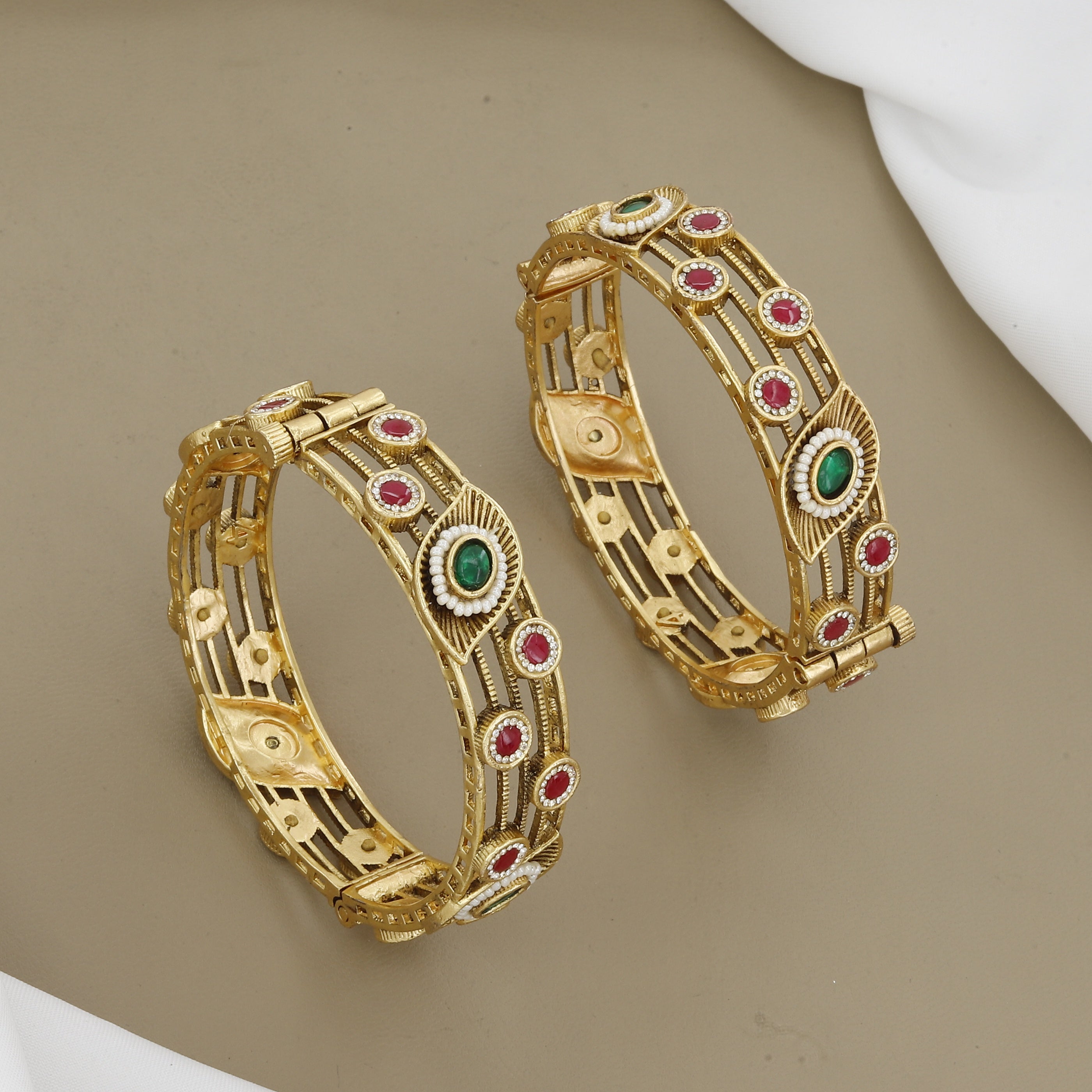 Modern Antique Gold Tone Patla Set with Ruby and Green Stones