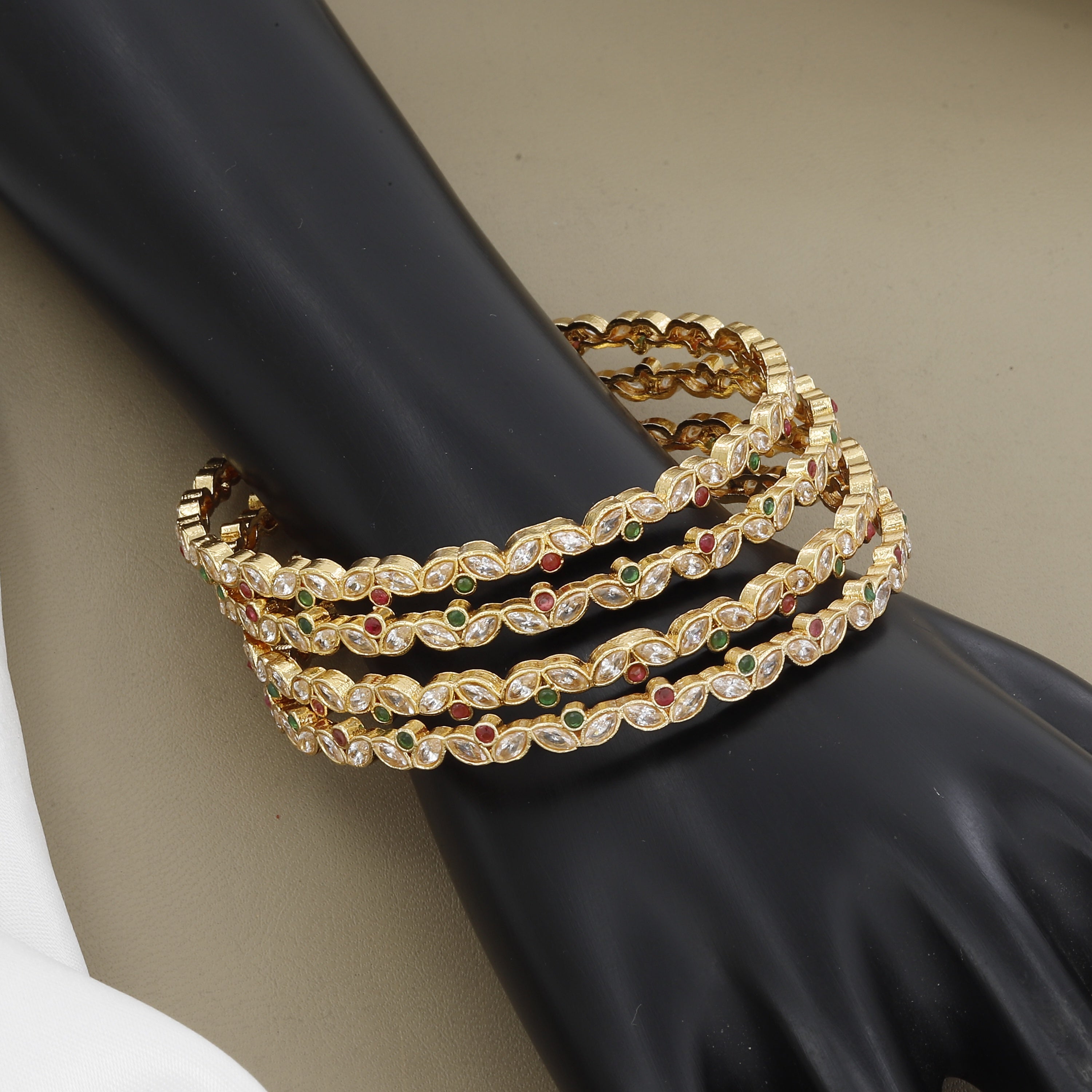 Ruby & Emerald Accents 4-Piece Gold Plated CZ Bangle Set