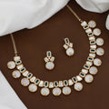 Contemporary Kundan Necklace Set with Emeralds & Mother-of-Pearl Drops