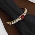 18k Gold Polished Regal Crimson Solitaire & White Stone Designer Bangle
