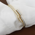 Modern Gold-Tone Chevron Bangle with Enamel & Crystals