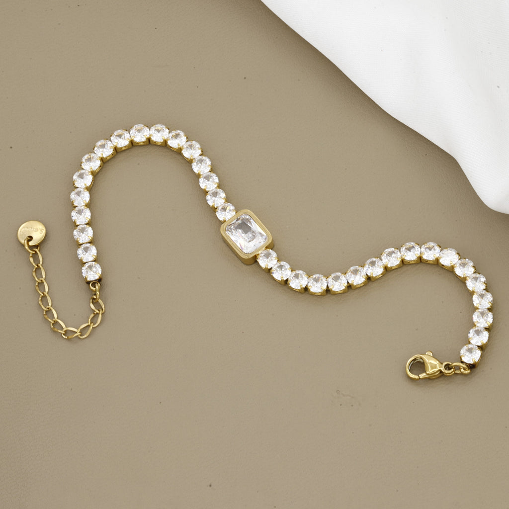 Gold Tennis Bracelet with Emerald Cut Center Stone