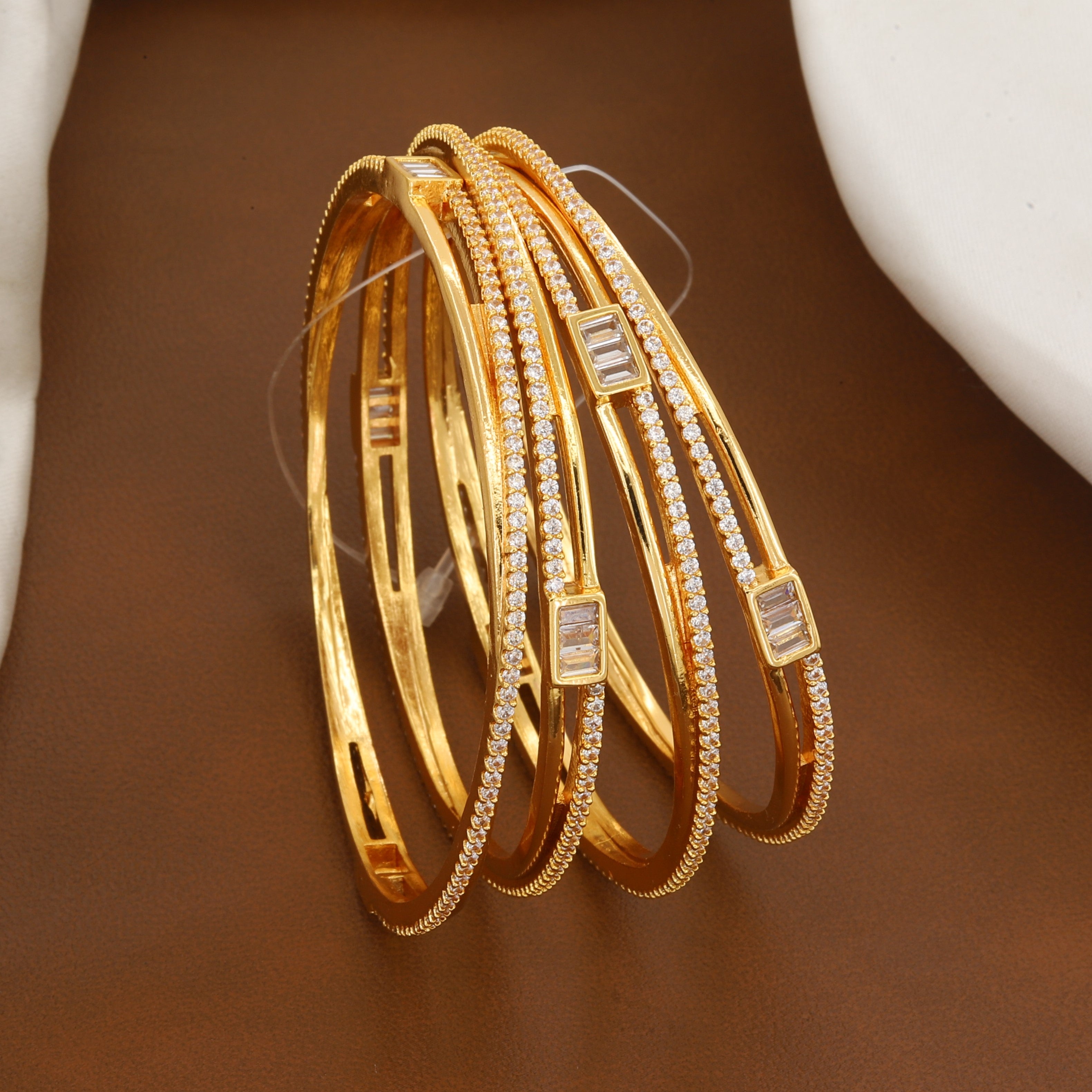 Sleek Gold-Tone CZ & Baguette Bangle Set of 4