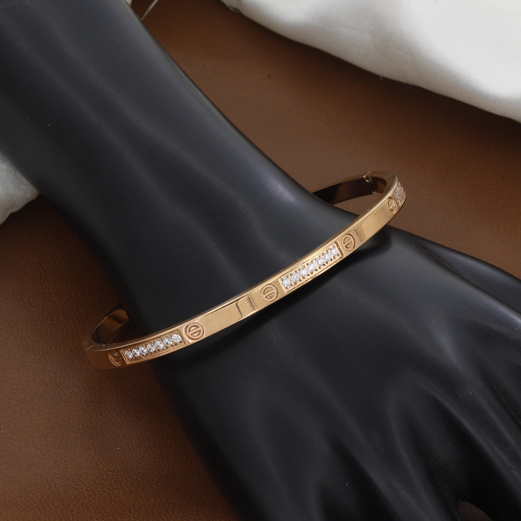 Elegant Gold Hinged Bangle Bracelet with Stone Accents