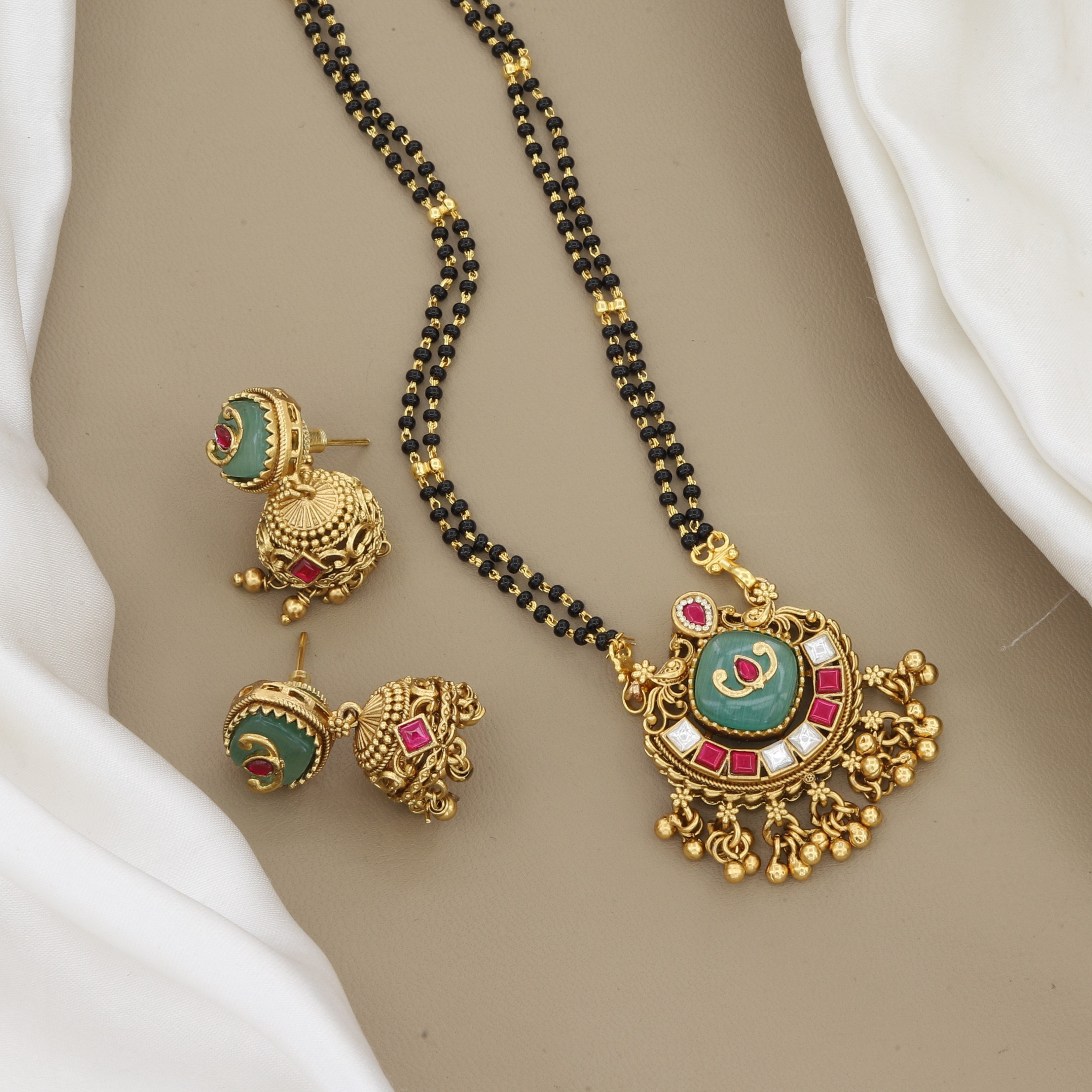 Traditional Gold Mangalsutra Set with Green Stone & Jhumkas