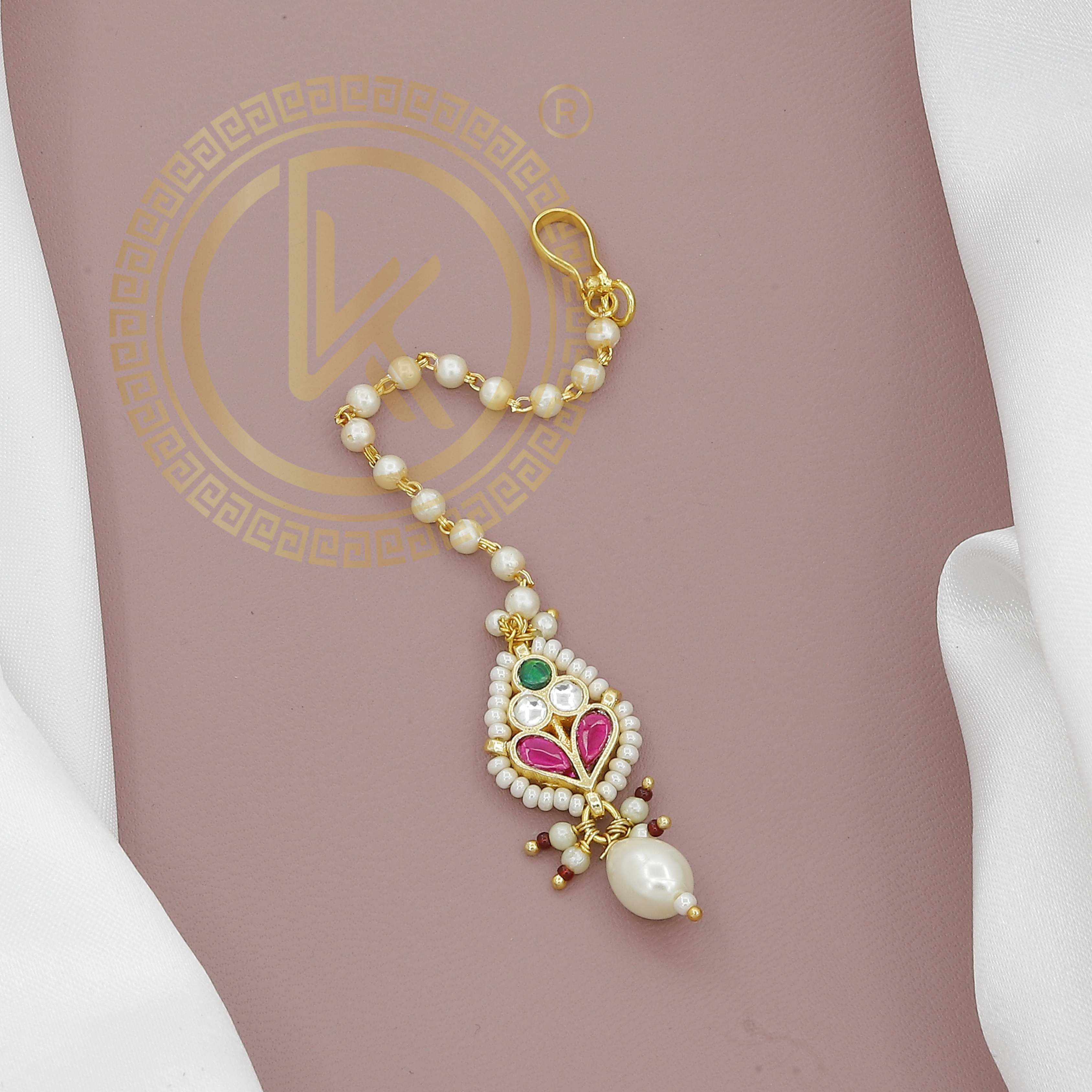 Elegant Pearl Maang Tikka with Green Drop & Pink Kundan Detailing