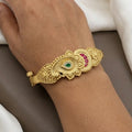 Antique Gold Plated Paisley Kada Bangle with Red & Green Stones