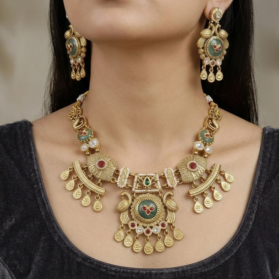 Gold Toned Peacock & Floral Motif Necklace Set with Ruby & Green Stones