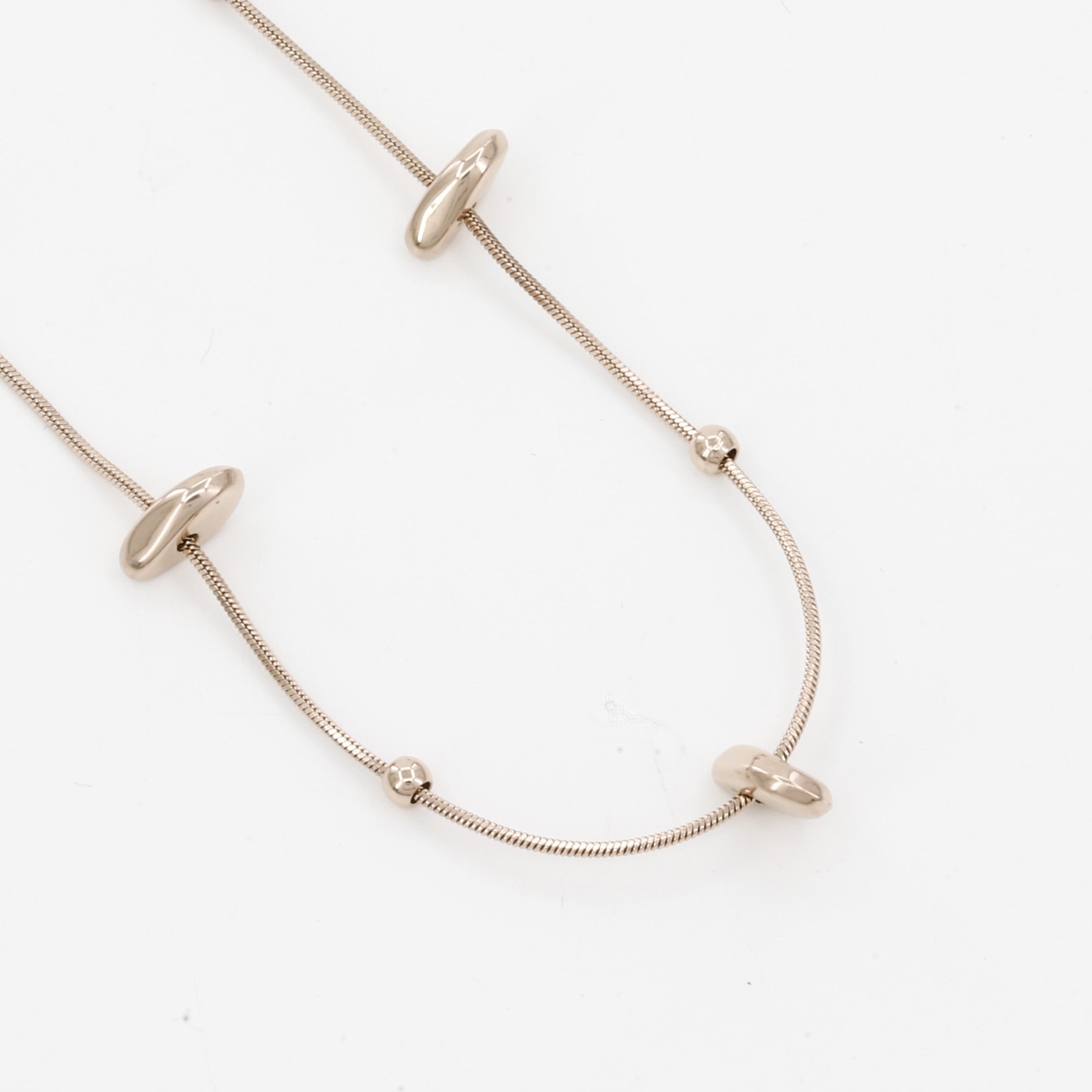 Minimalist Gold Pebble Station Necklace