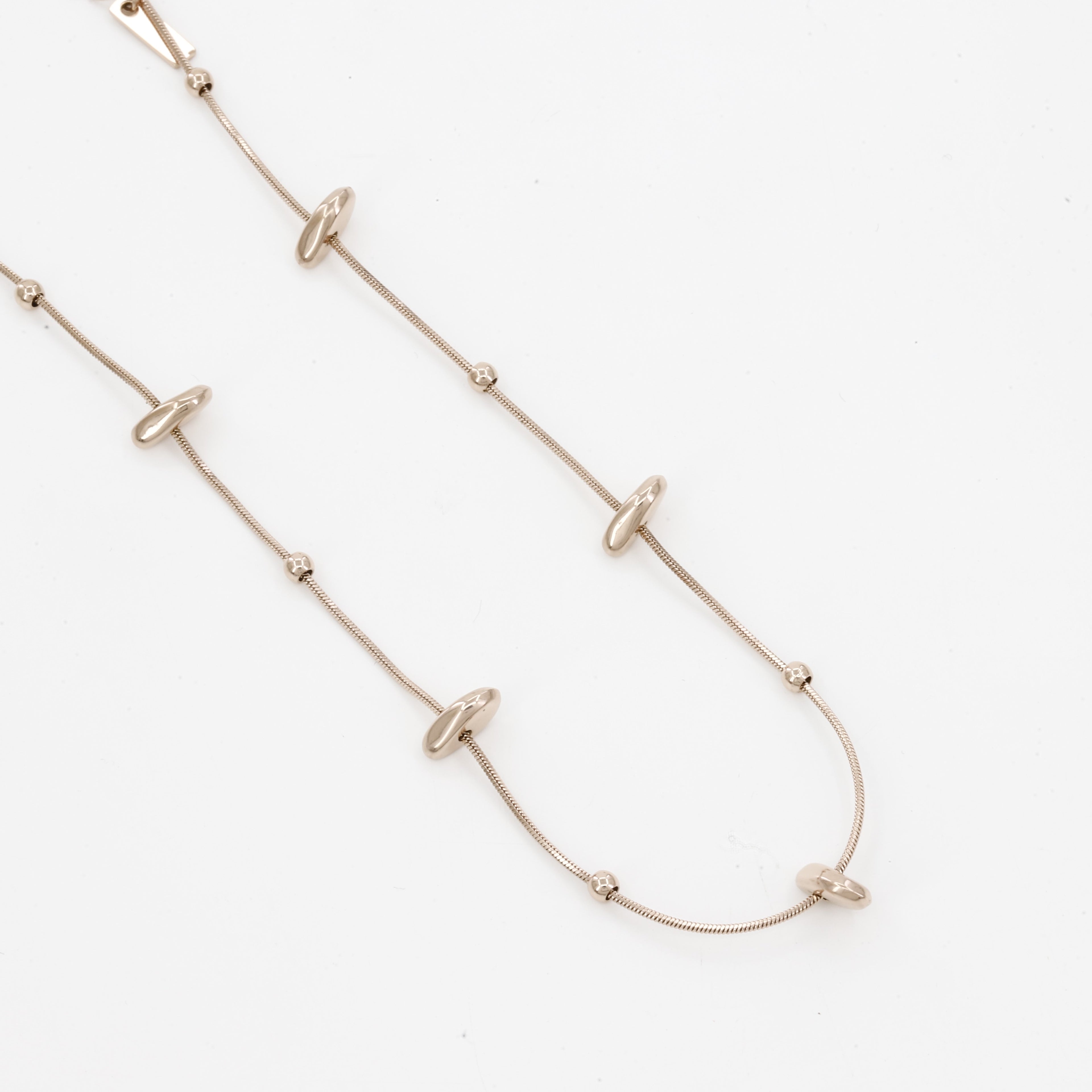 Minimalist Gold Pebble Station Necklace