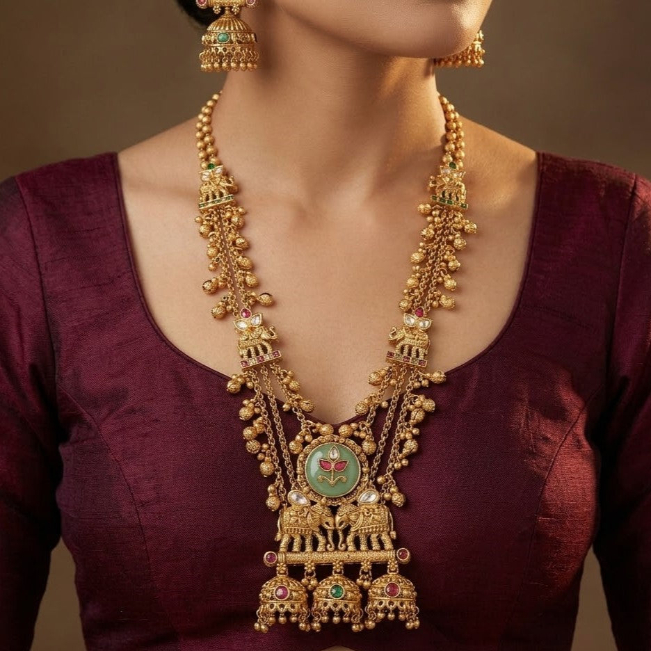 Traditional Elephant Motif Gold-Toned & Green Stone Temple Jewelry Set
