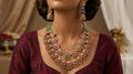 Luxurious Tiered Ruby & Kundan Necklace Set with Green Beaded Chain