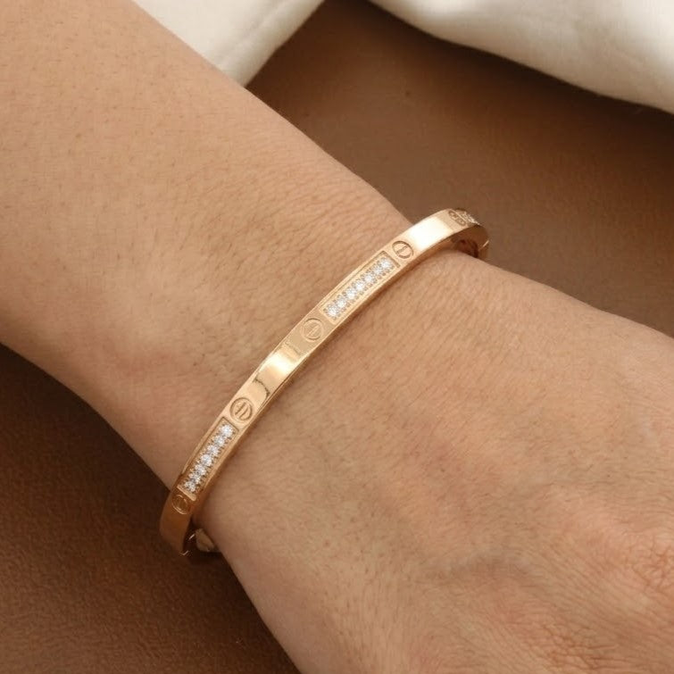 Elegant Gold Hinged Bangle Bracelet with Stone Accents